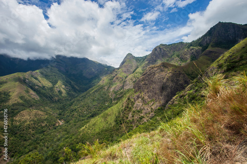 Mountain landscape with blue sky long wide angle shot