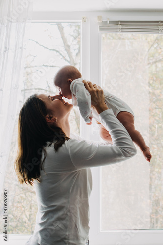 Mental Health in Postpartum Time. Maternal Mental Health. Pregnancy And Postpartum Disorders, postpartum baby blues, depression. Portrait of mother and newborn baby photo