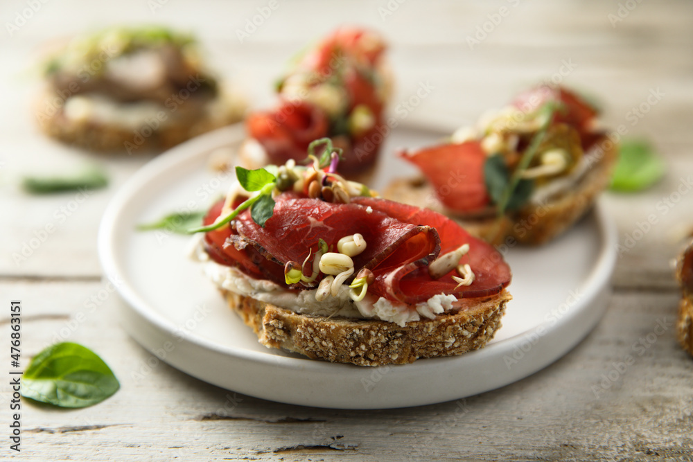 Bruschetta with meat and cream cheese Bruschetta with meat and cream cheese