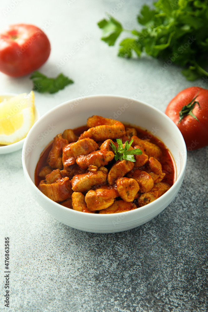 Traditional homemade chicken ragout with tomato sauce Traditional homemade chicken ragout with tomato sauce