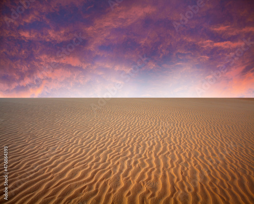 A dune is a landform composed of wind- or water-driven sand. It typically takes the form of a mound  ridge  or hill For background and layer