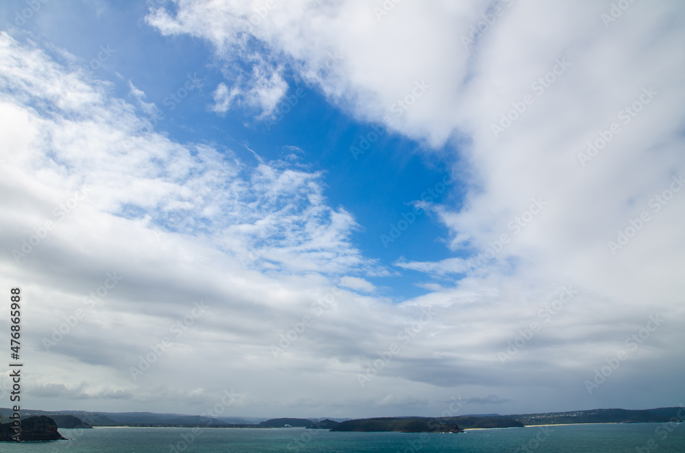 Beautiful cloudy sky with dark blue ocean view at Bondi bay, Sydney, Australia.