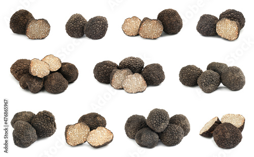 Set with expensive delicious black truffles on white background