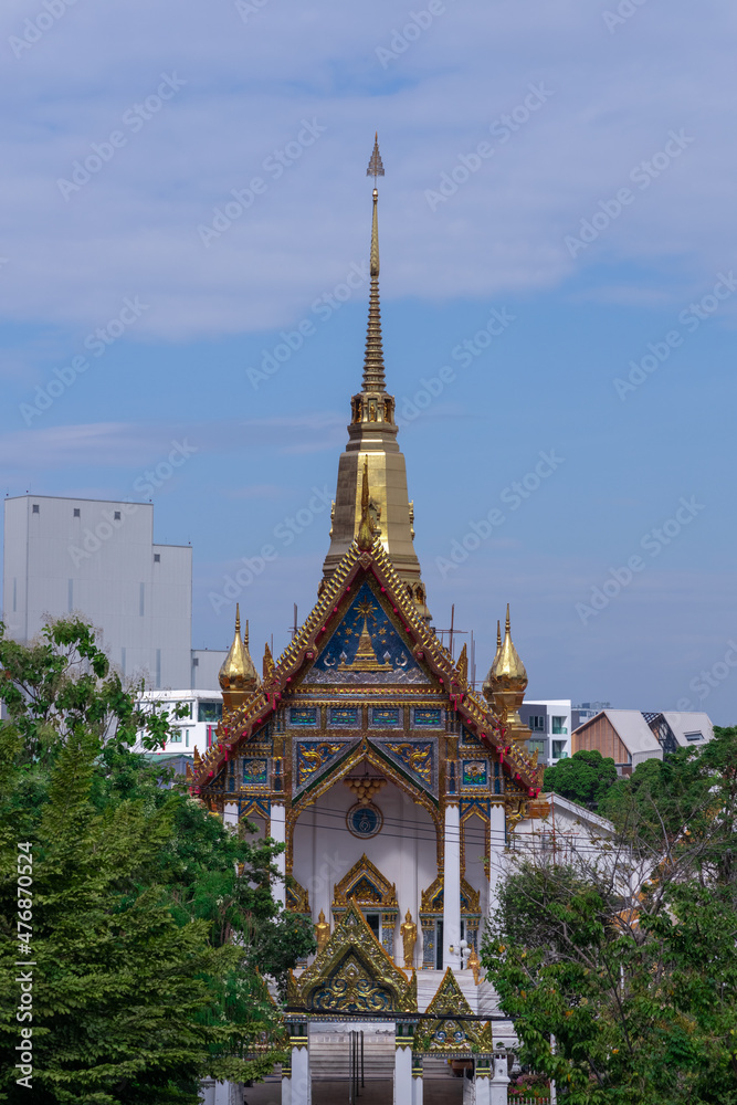 Buddhist temple Was on Sukhumvitt Rd BKK Bangkok Thailand, vivid lush colours if the buildings are glorious