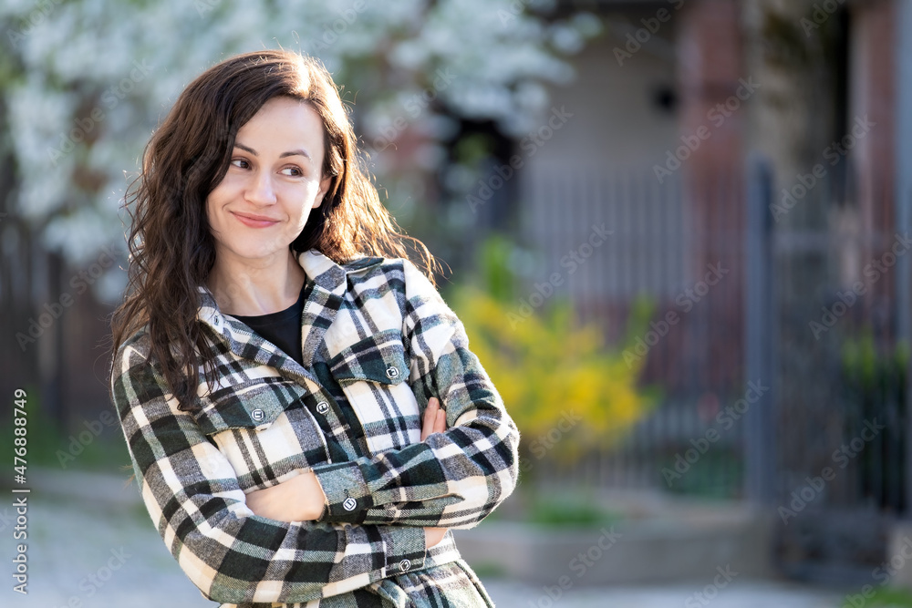 Portrait of pretty young woman relaxing outdoors on warm spring sunny day. Portrait of pretty young woman relaxing outdoors on warm spring sunny day.