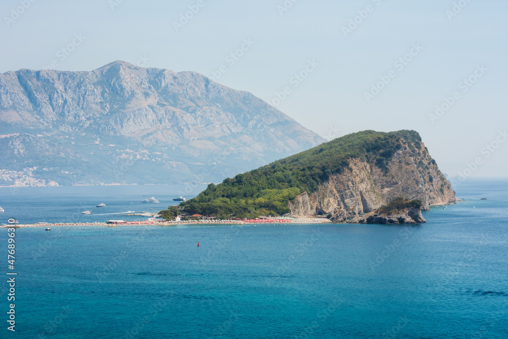 Hawaii beach, seafront view at St. Nicholas Island in Adriatic Sea near town Budva, Montenegro, Europe