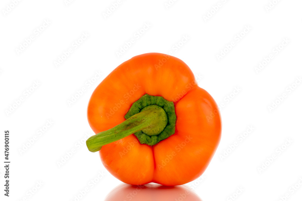 One ripe orange bell pepper, close-up, isolated on white. One ripe orange bell pepper, close-up, isolated on white.