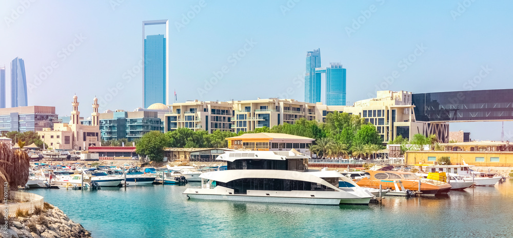 Beautiful, panoramic views of Abu Dhabi and yachts. Sunny day with clear skies. United Arab Emirates