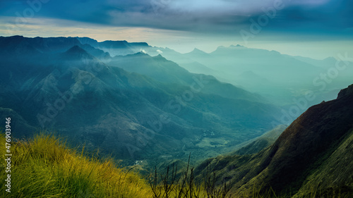 Amazing mountain landscape with clouds, tea estate natural outdoor travel background. Beauty world.