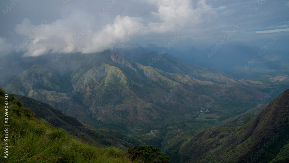 Fototapeta premium Amazing mountain landscape with clouds, tea estate natural outdoor travel background. Beauty world.