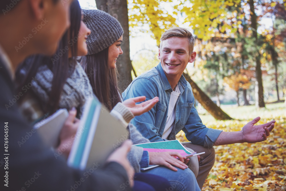 Fototapeta premium Students in autumn park