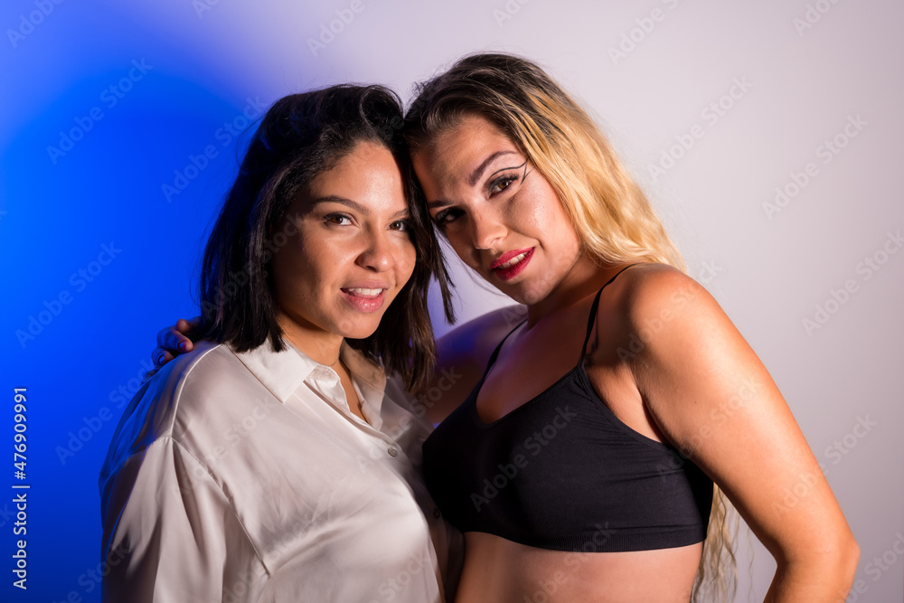 Model with makeup artist lovingly after studio session Model with makeup artist lovingly after studio session