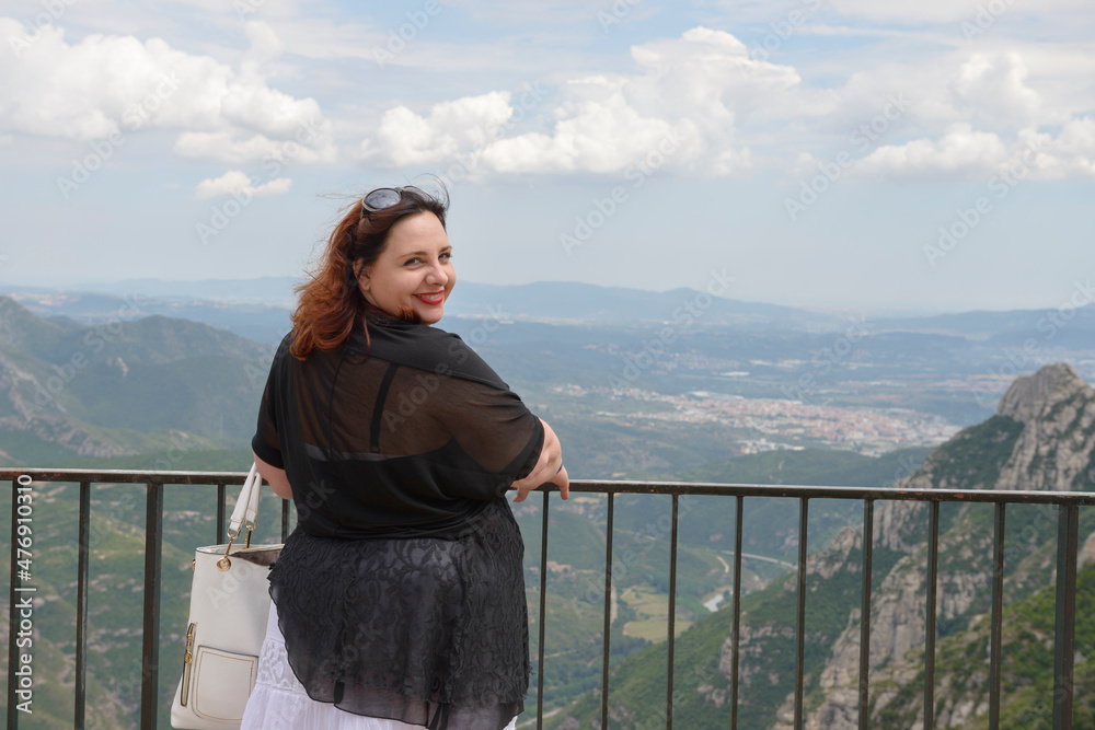 Woman on Llobregat valley background, Montserrat, Catalonia, Spain.
