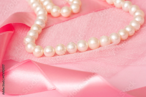 Beautiful pearl necklace on cloth.