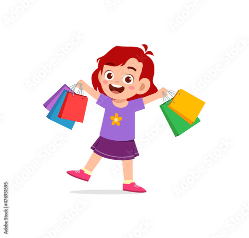cute little girl carry many sopping bags