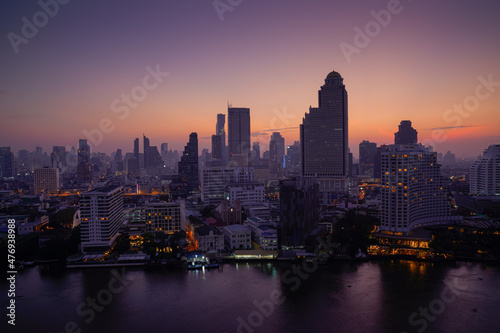 Bangkok Skyline from Thonburi side of the Chao Phraya River at Sunrise  © Mike To