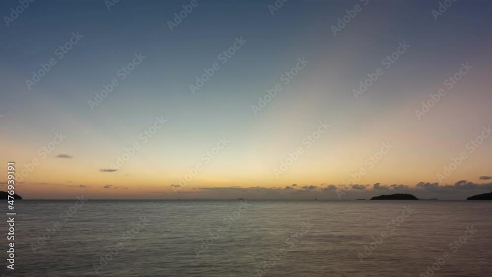 Time Lapse clouds in sunrise time Beautiful light of nature Amazing colors of sun Majestic clouds flowing in sunrise sky Dark clouds Time Lapse sky in phuket island Thailand Time Lapse clouds in sunrise time Beautiful light of nature Amazing colors of sun Majestic clouds flowing in sunrise sky Dark clouds Time Lapse sky in phuket island Thailand