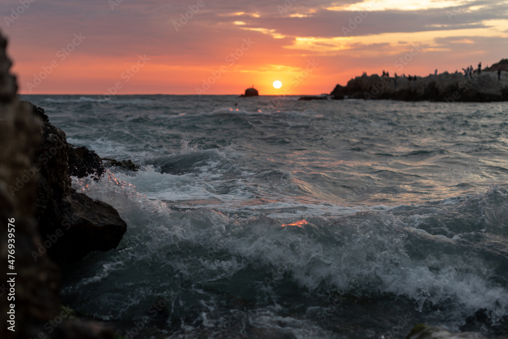 beautiful sunset on the sea in a storm