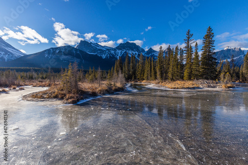 Three Sisters from a frozen Policemen's Creek in winter, Canada