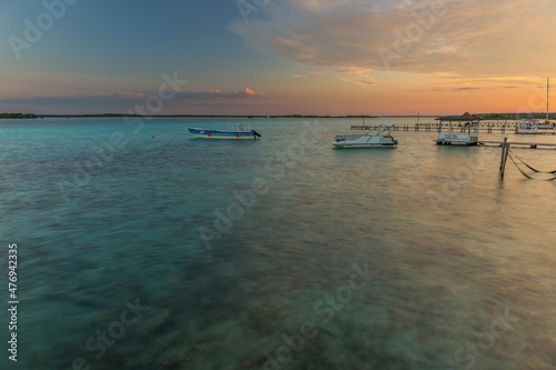 Caribbean sunset scene at Bacalar lagoon, Mexico © Pavel
