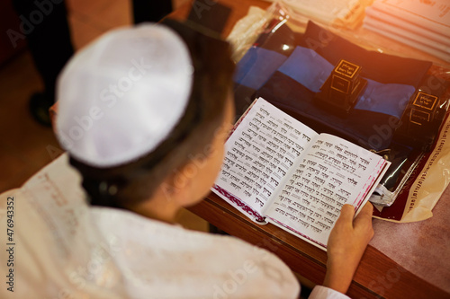 Photo Reading from the Torah during a Bar Mitzvah ritual.