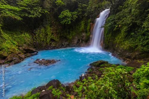 Waterfall and natural pool with turquoise water of Rio Celeste, Costa Rica © Pavel