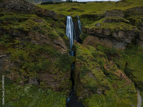 Beautiful aerial footage of the Seljalandsfoss and Gljufrabui waterfalls in Iceland on summer