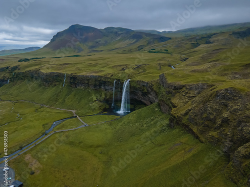 Beautiful aerial footage of the Seljalandsfoss and Gljufrabui waterfalls in Iceland on summer