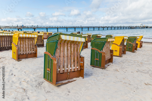 typical Northern German beach chairs, called Strandkorb, at the Baltic Sea photo