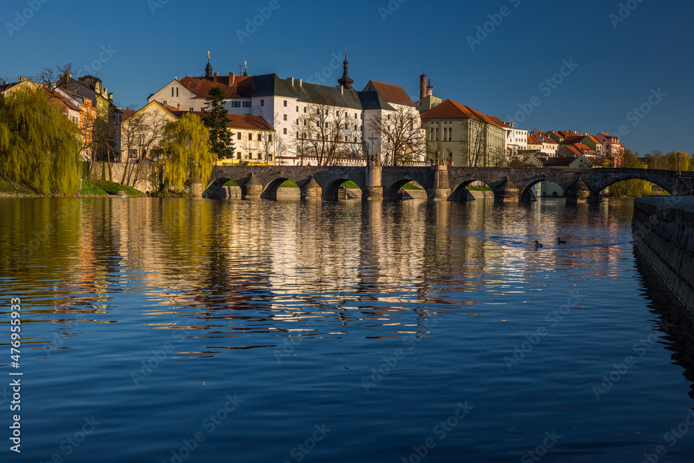 Obraz premium Oldest bridge in Czech republic. Beautiful evening twilight with beautiful bridge in Pisek.