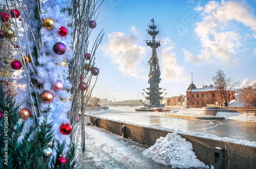 Monument to Peter the Great and New Year's toys on the embankment in Moscow