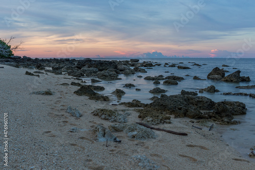 Long exposure during low tide with exposed coral on Turtle Island, Borneo photo