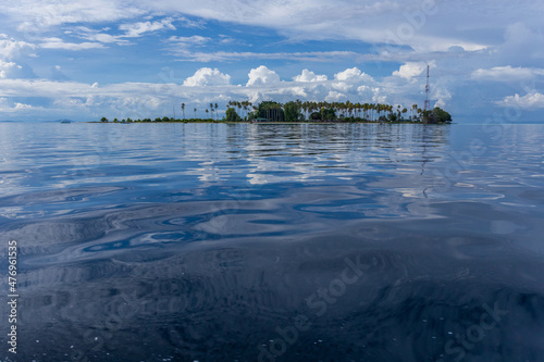 Sibuan island with turquoise water and beautiful beach, Borneo photo