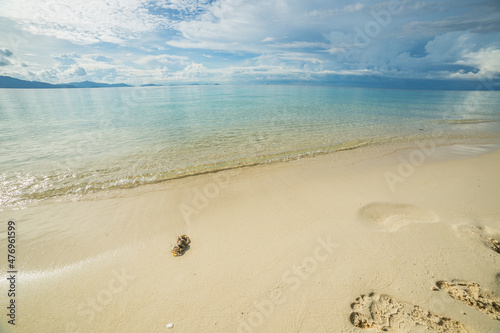 Sibuan island with turquoise water and beautiful beach, Borneo photo