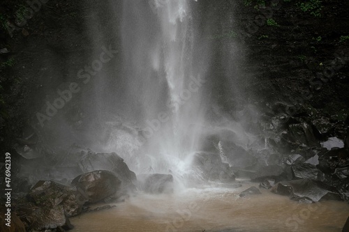 waterfall called Coban Rondo, Indonesia © Jason