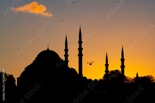 Mosque background photo. Silhouette of Suleymaniye Mosque at sunset in Istanbul