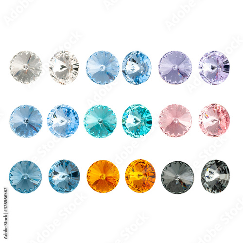 Crystal transparent multi-colored strasses and crystals of a round shape. Isolated on white background