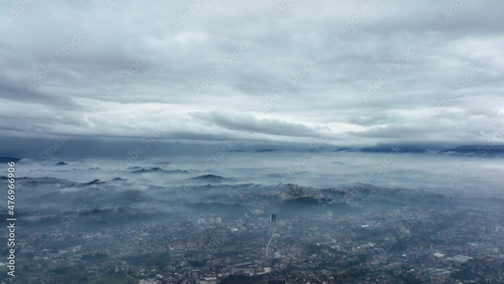 View from above, stunning aerial view of a valley covered by fog during a winter day. Frosinone, Italy. View from above, stunning aerial view of a valley covered by fog during a winter day. Frosinone, Italy.
