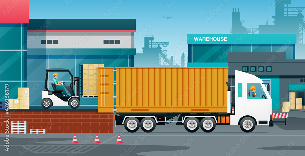 Workers loading goods into trucks with containers. Workers loading goods into trucks with containers.