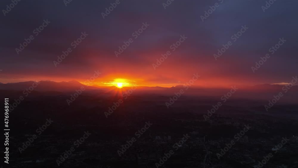 View from above, stunning aerial view of a the city of Frosinone illuminated by a beautiful sunrise. Frosinone, Italy.