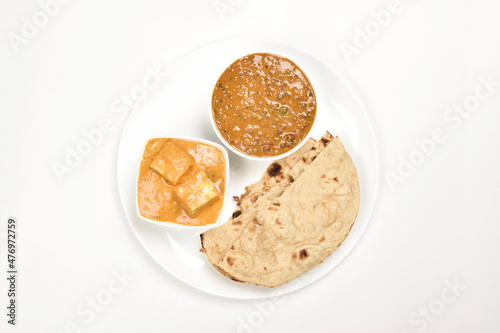 shahi paneer and dal makhani served with roti photo