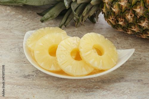 Marinated pineapple rings in the bowl