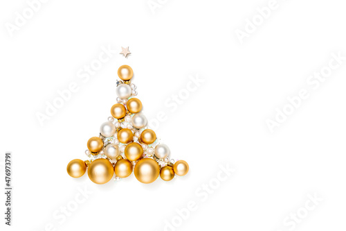 Christmas tree made of bauble ornaments against white background. Christmas composition, winter or new year's arrangement. Flat lay, top view, copy space.