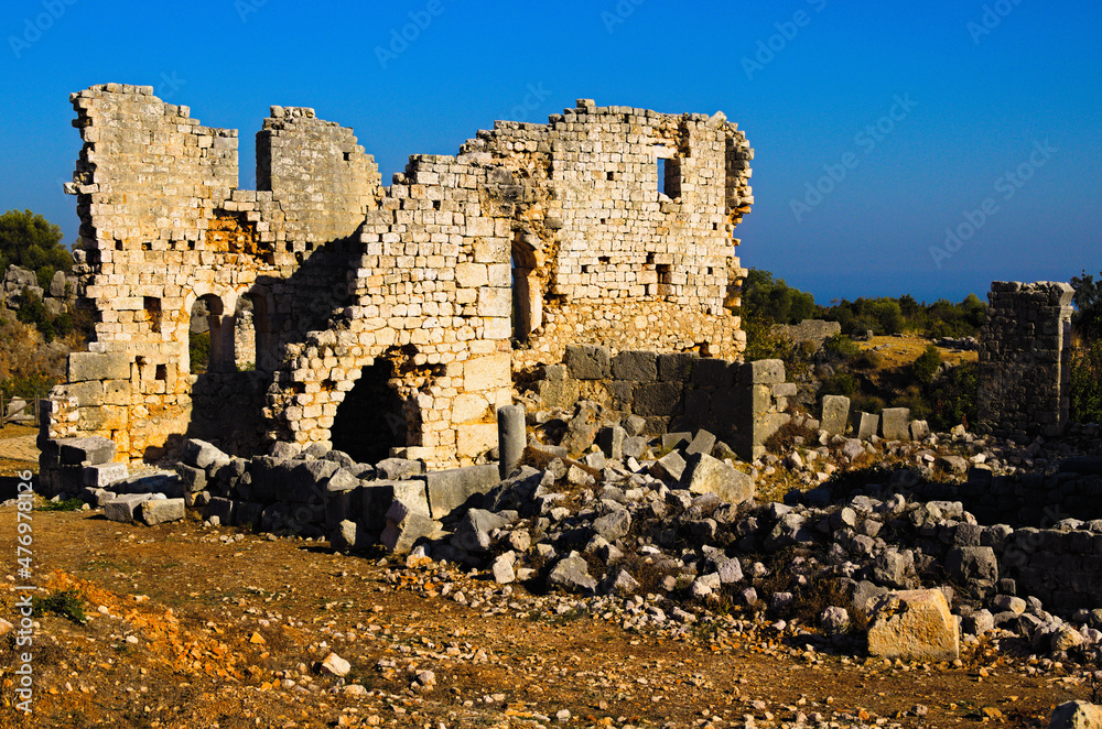 Kizkalesi,Turkey-October 11,2021:Picturesque landscape view ruins of antique city. Kanlidivane ancient city in Mersin Province, Turkey. Open air museum