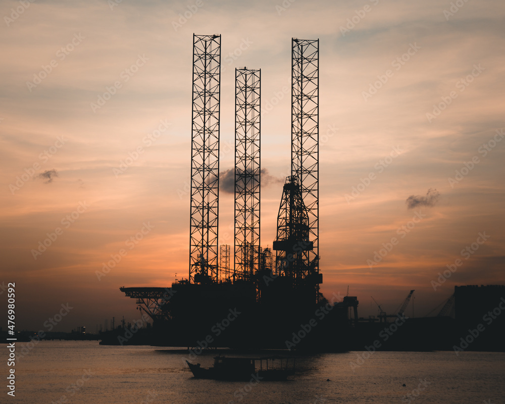oil rig at sunset