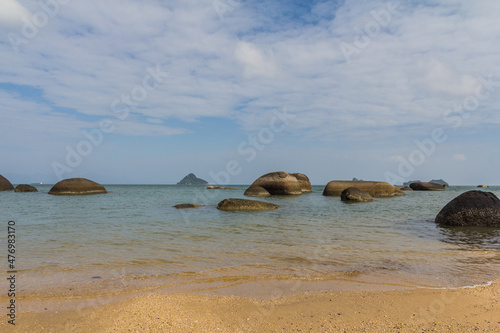 Fototapeta Naklejka Na Ścianę i Meble -  Beautiful black sand beach with boulders. Langkawi, Malaysia.