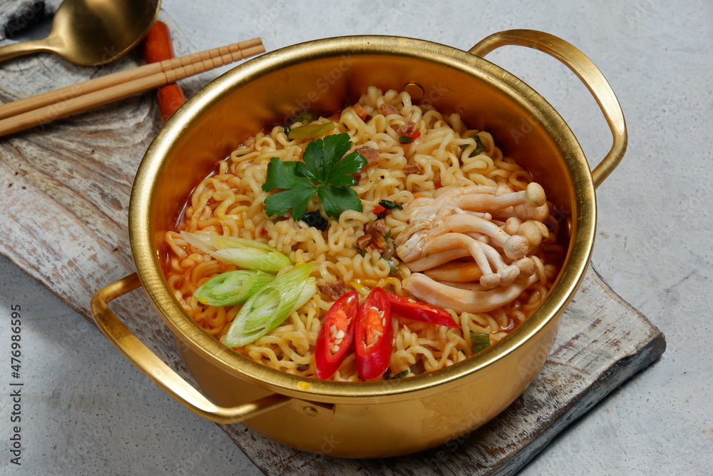 Serving a Korean style instant noodle, Ramyeon or Ramyun with spicy ...