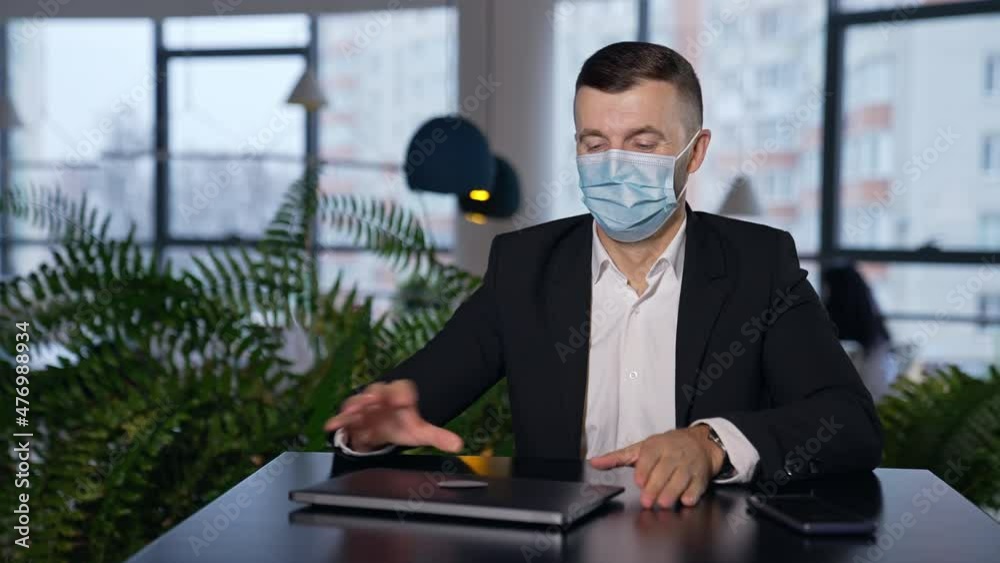 Handsome smart man with laptop. Succesfull businessman working in modern office. Handsome smart man with laptop. Succesfull businessman working in modern office.