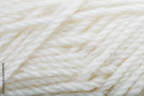 White wool yarn close-up in full screen