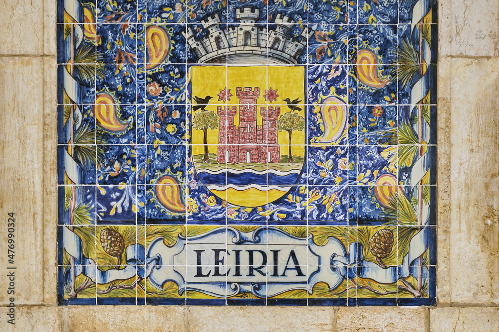 azulejos panel representing monuments and country scenes on the walls of Leiria station, Portugal.. azulejos panel representing monuments and country scenes on the walls of Leiria station, Portugal..